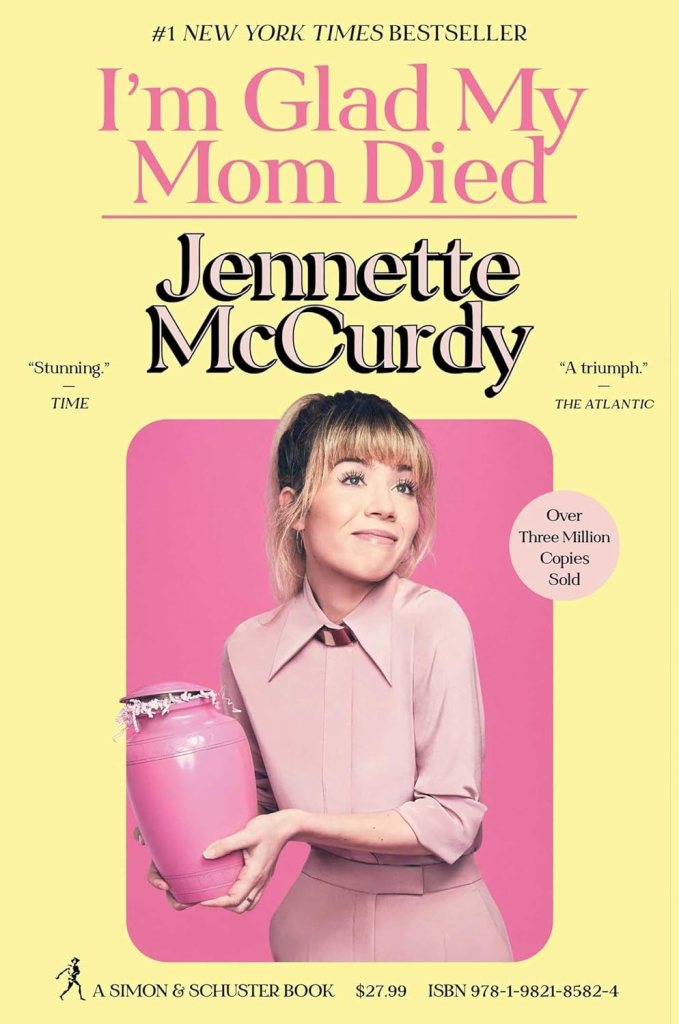 Book cover of 'I'm Glad My Mom Died' by Jennette McCurdy, featuring a smiling woman in a pink outfit holding a pink urn. The cover includes praise quotes and sales information.